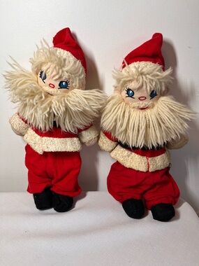 pair of vintage 1960s Santa Claus plush dolls mid-century Christmas collectibles